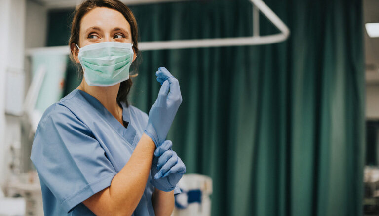 Nurse getting ready for work