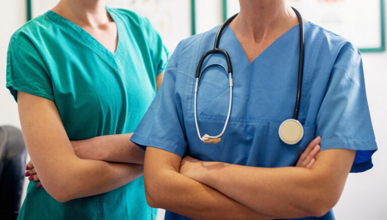 Nurses standing with arms crossed
