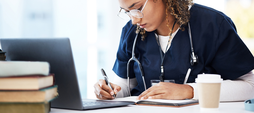 Student nurse filling out a scholarship application